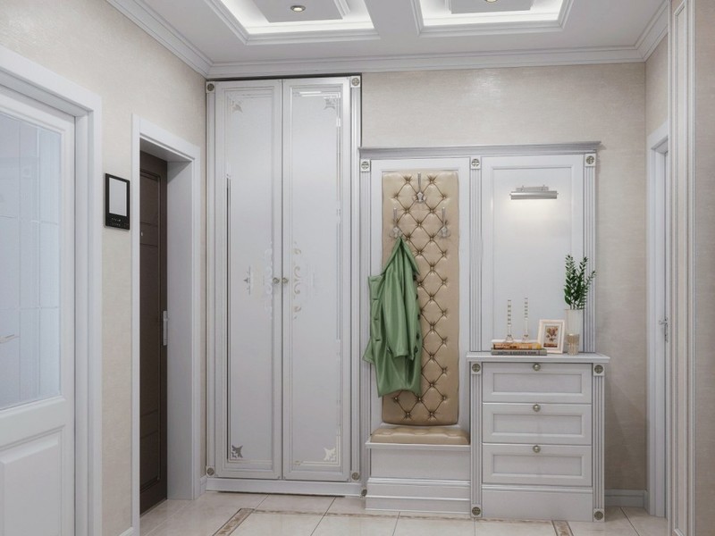 Sala mică de intrare cu un dulap alb